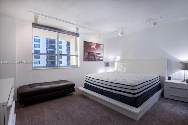 Building Photo - 10185 Collins Ave