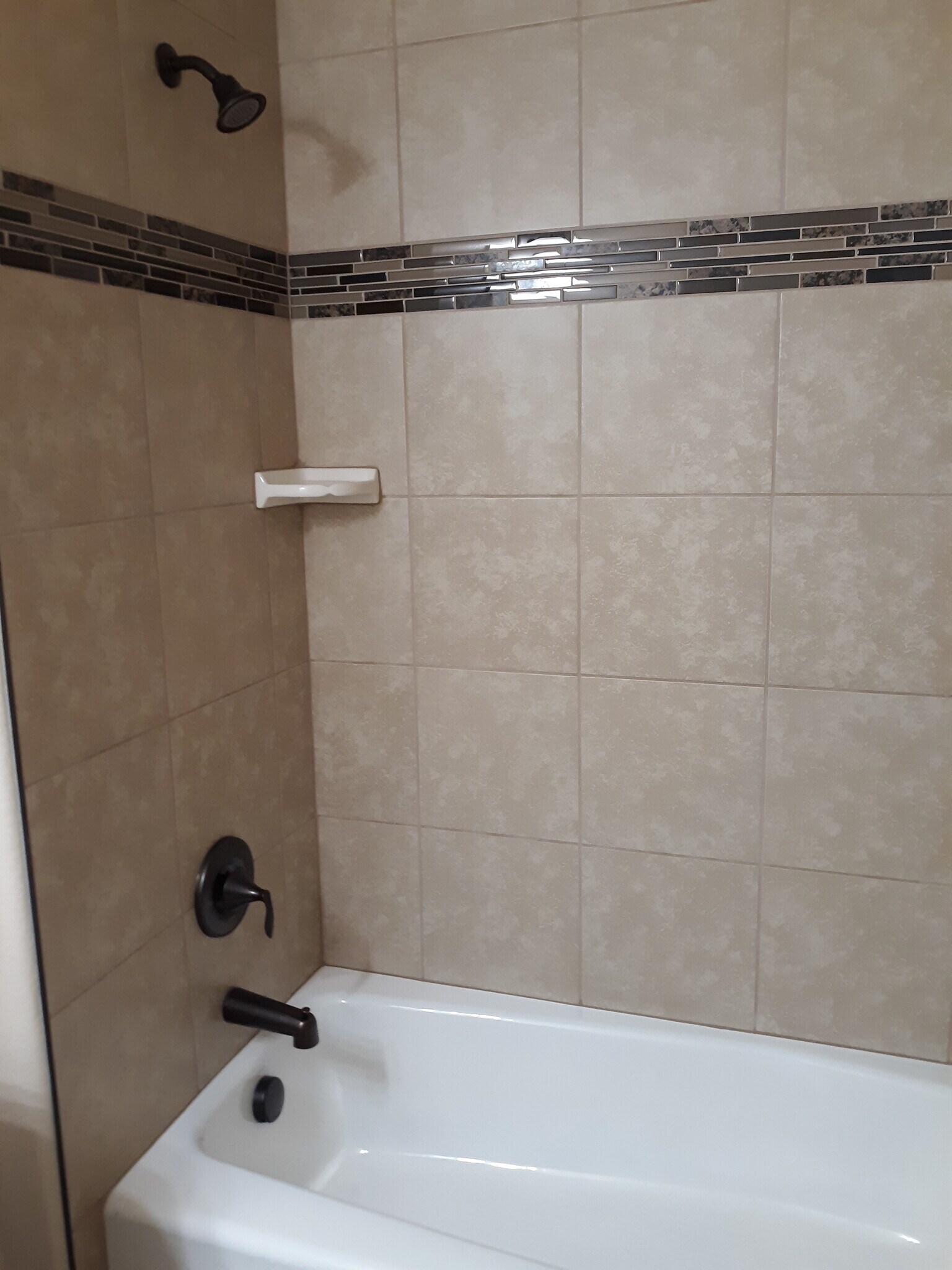 hall bathroom has surround tile bath shower - 2310 Cliffmoor Ln
