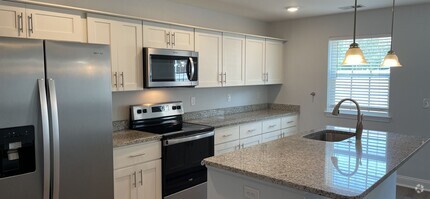 Building Photo - Newly built 3 bedroom/2.5 bath condo near ...