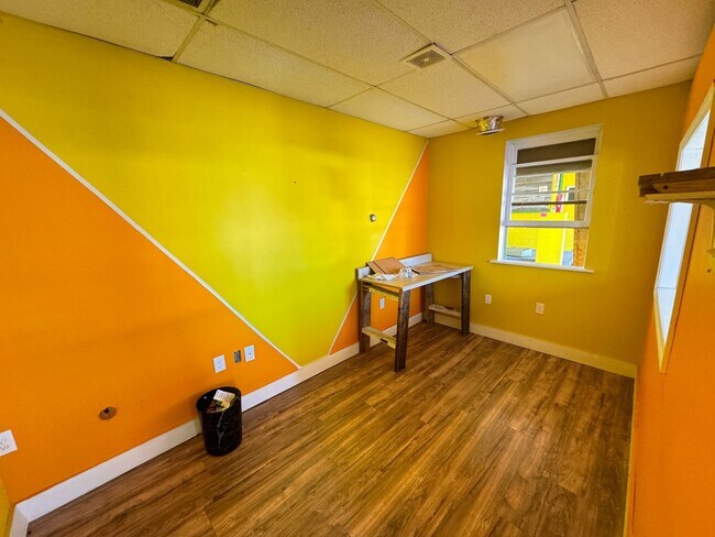 Building Photo - Prime Commercial Space for Rent in Downtown Granite Quarry - 1,323 Sq Ft with Bay Doors