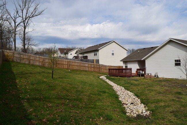 Building Photo - Located in the popular Woodland Hills Subd...