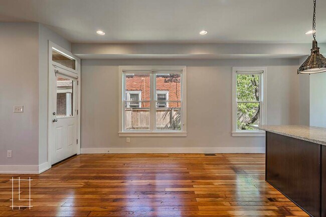 Building Photo - Available Now: One Month Free Rent!