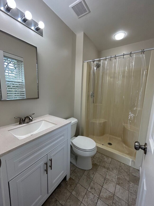 Building Photo - Space, Style - Move-In Ready 4-Bedroom End Unit with Finished Basement & Garage