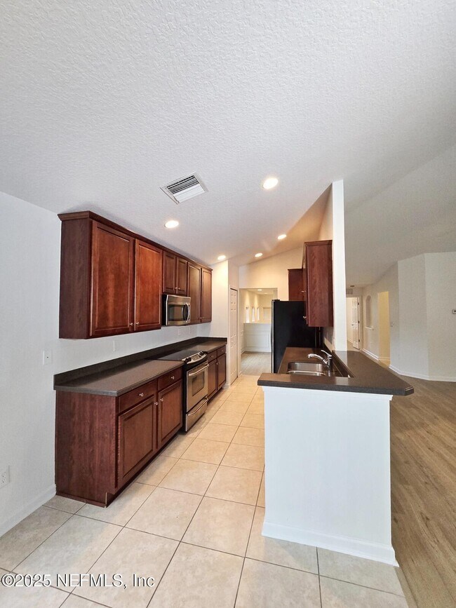 Building Photo - 6591 White Blossom Cir