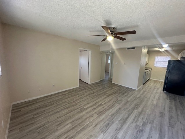 Livingroom/Kitchen View - Tigua Village- All Utilities Included