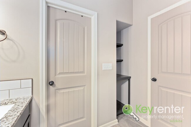 Building Photo - Spacious 4-Bedroom Home with Finished Basement & 3-Car Garage – Derby, KS