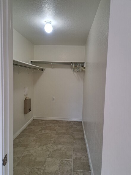 Master bedroom walk-in closet - 6511 Flatstone Pass