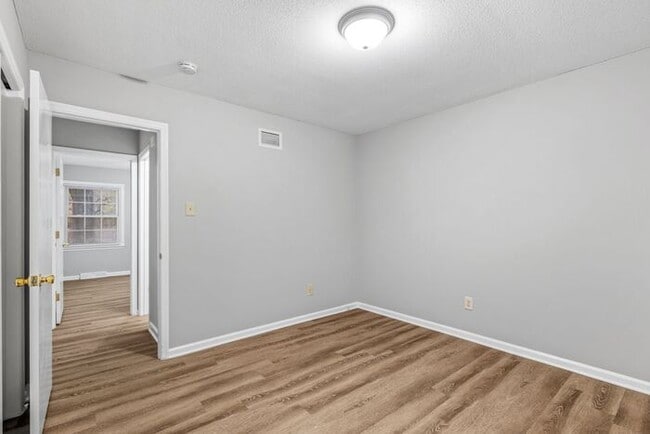 Building Photo - McLeansville - Minutes from Elon & Greensboro! Few Acres, Brick Duplex, Just Painted, New Carpet,...