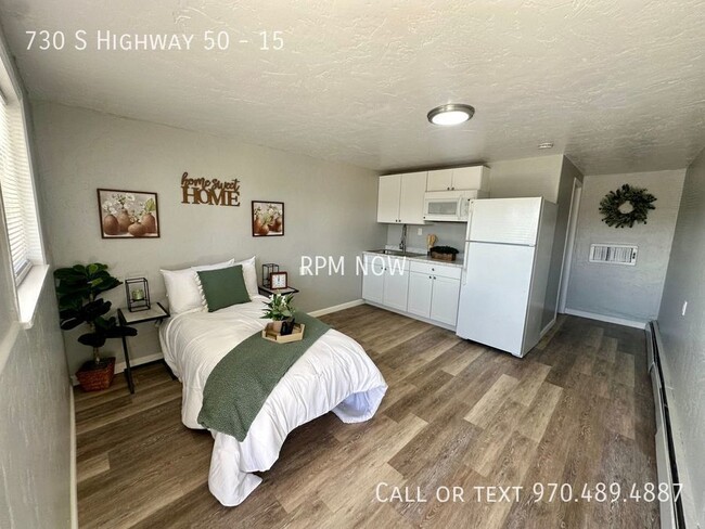 Building Photo - Updated Unit with Hard floors! Utilities i...