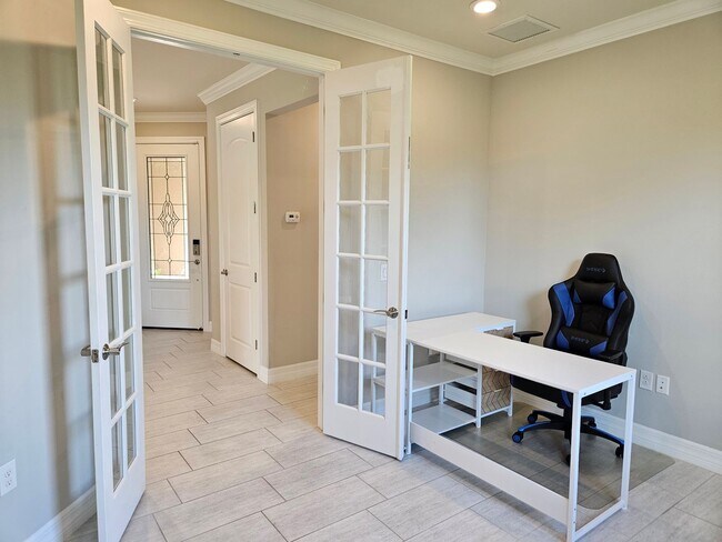 Building Photo - Stunning Model Home – 2 Bedrooms plus Den,...