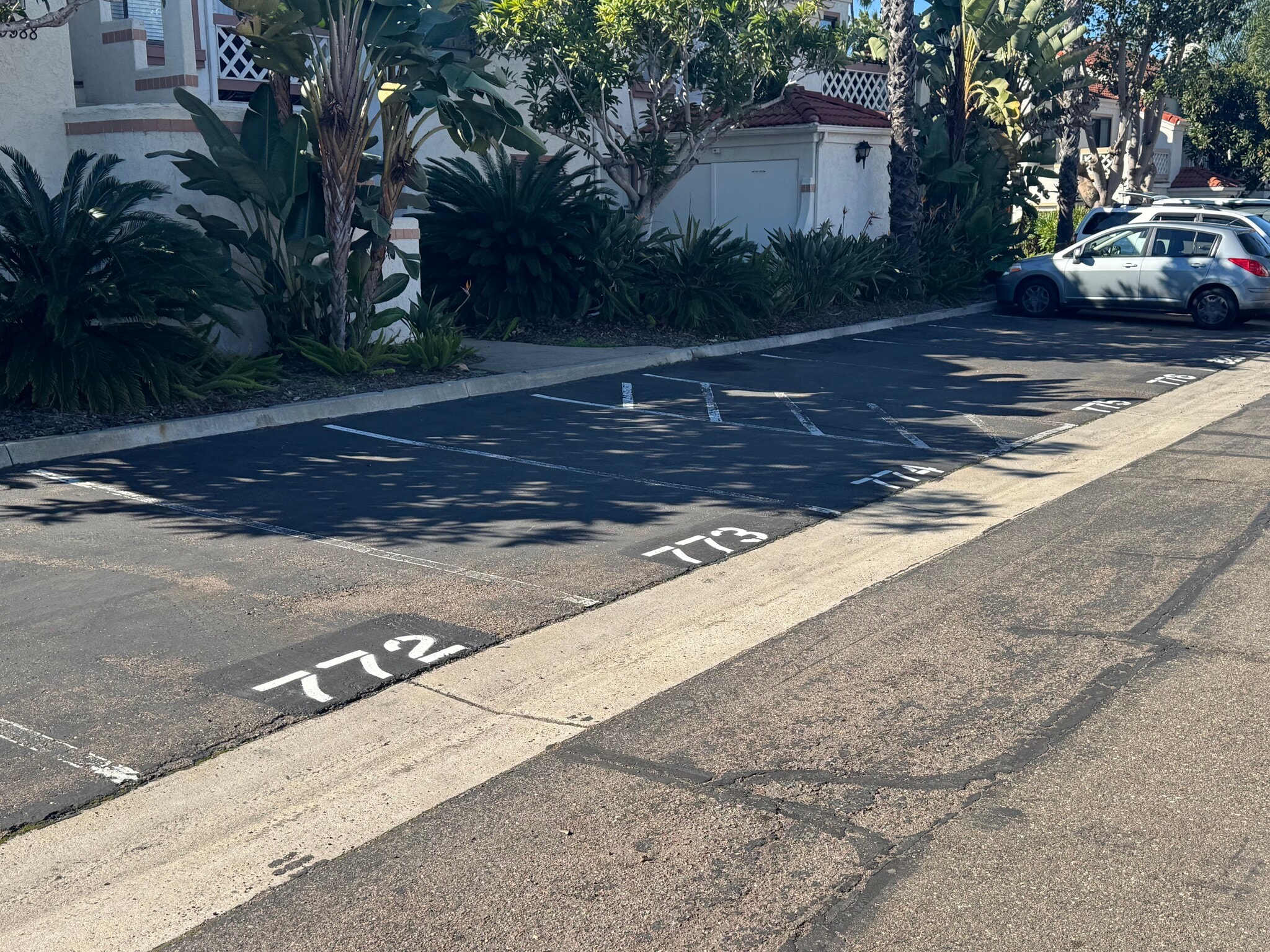 One uncovered parking spot - 9408 Twin Trails Dr