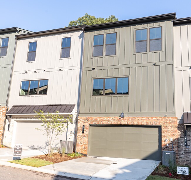 Rear of Townhome & Private Driveway - 145 Firefly Cir