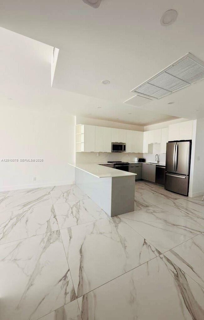 Building Photo - 19370 Collins Ave