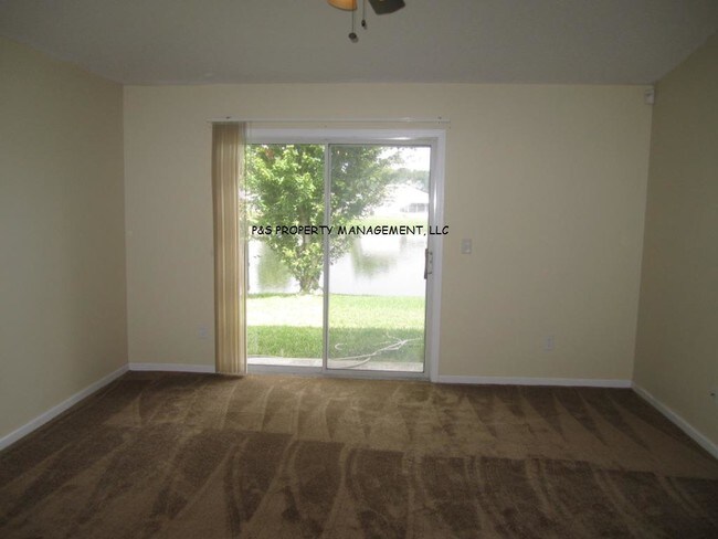 Building Photo - 7493 International Village Dr