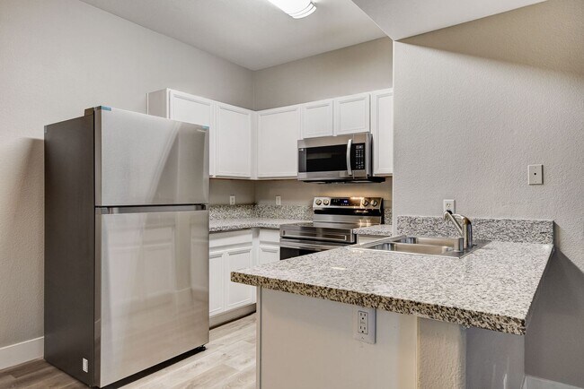 Building Photo - Upgrated upstairs 2 Bedrm 2 bath Gated Com...