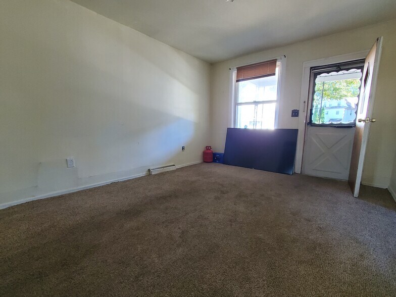 Living Room facing Window and Front Door - 53 Orchard St