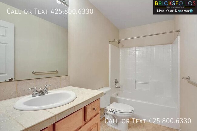 Building Photo - Dream Kitchen, Dual Fireplaces: Find Your Stylish Sanctuary in Redmond Ridge.