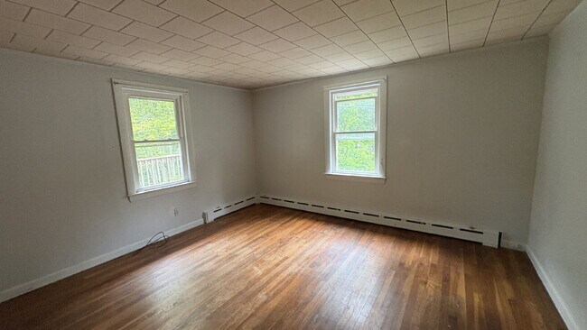 Building Photo - Spacious 4BR Single-Family Home with Fire Pit, Chicken Coop & 2-Car Garage!
