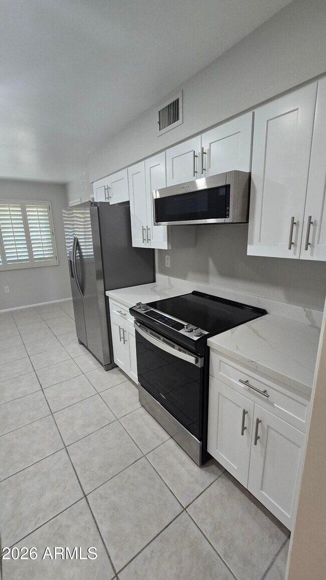 Building Photo - 10715 W Tropicana Cir