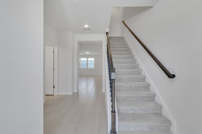 Building Photo - Luxurious Townhome in Lake Nona - A Perfec...