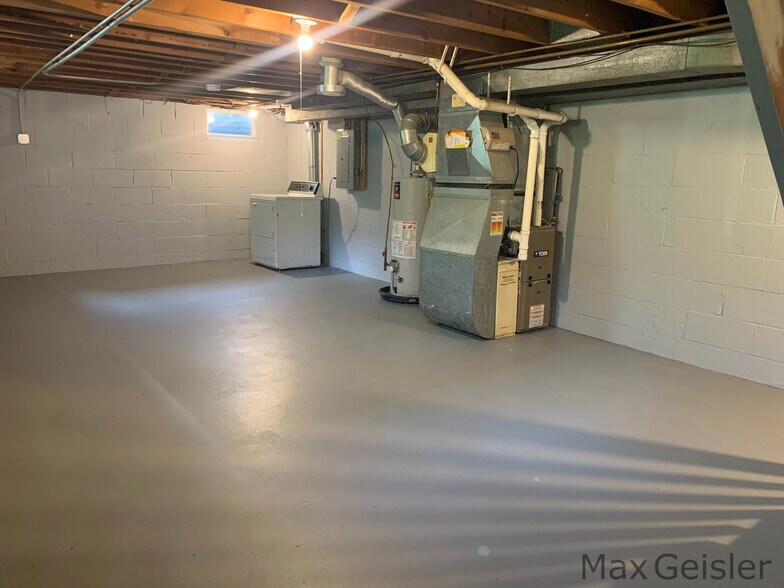Basement viewed from south next to washer. - 404 12th Ave N