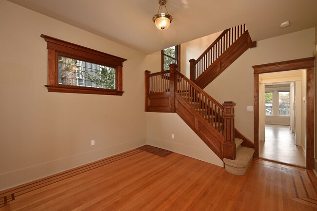 Building Photo - Traditional Four-Corner Craftsman Home on ...