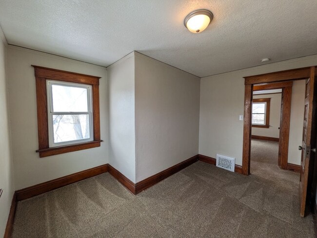 Building Photo - Large 4 Bedroom Home with Garage, Deck, & Fence!