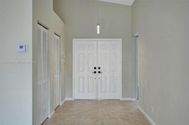 Building Photo - 10219 NW 48th Manor