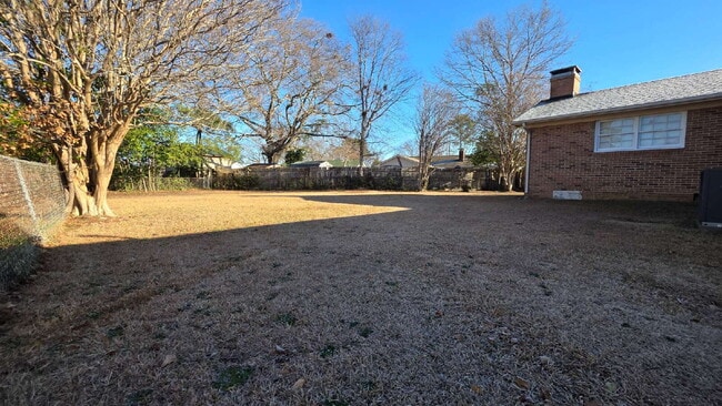 Building Photo - Updated 3-Bedroom Home with Open Layout and Large Backyard