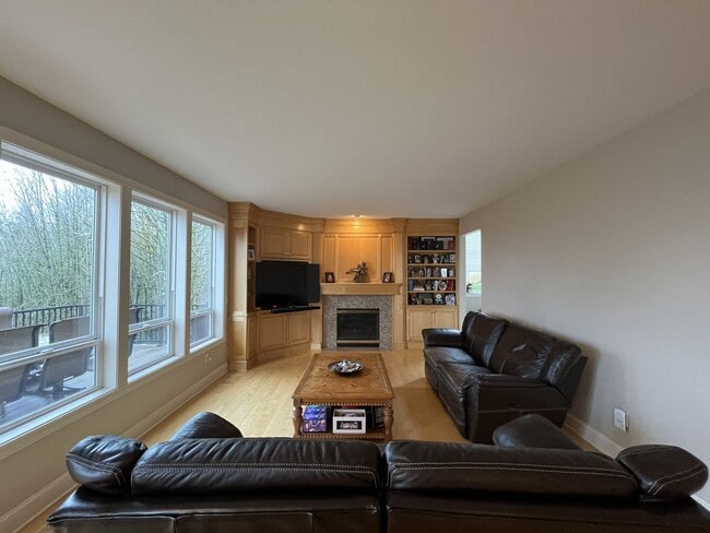 Building Photo - Executive-Style Northwest Heights Home with Forest Views and Refined Architectural Details