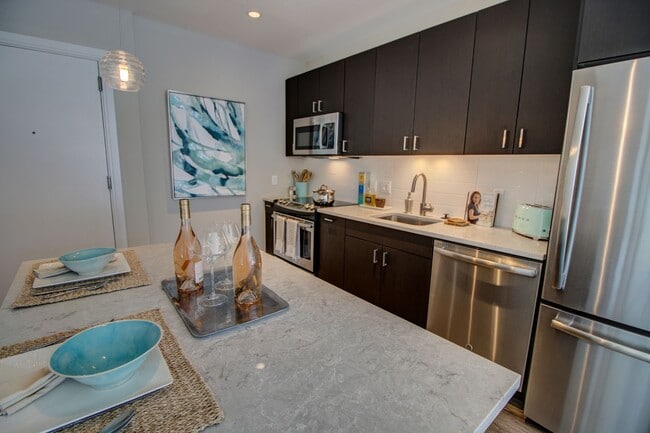 New Chef's Kitchen with Prep Island - VIA Seaport Residences