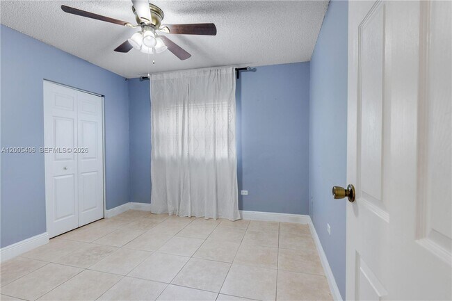Building Photo - 8390 N Missionwood Cir