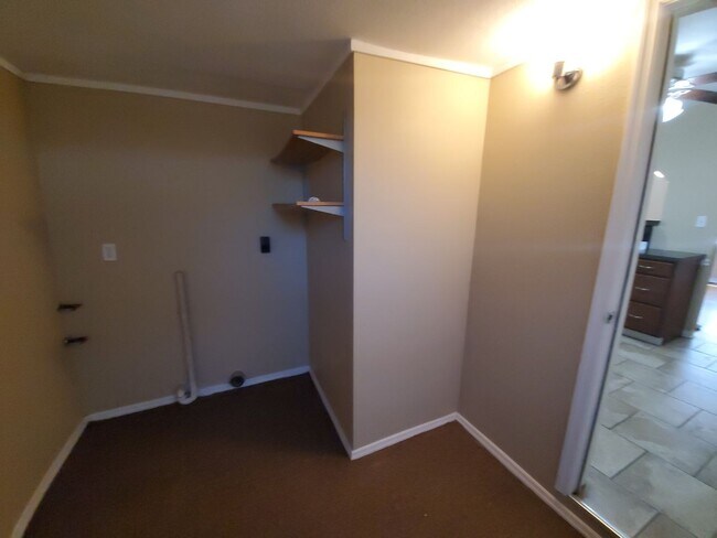 Building Photo - Two Bedroom House with carport