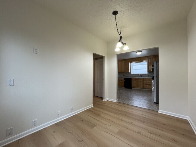 Building Photo - Character-Filled Concordia Home with Flexible Living Spaces & Gas Fireplace