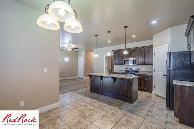 Building Photo - Dog Friendly, Pleasant 4 Bedroom, 2.5 Bathroom Townhome