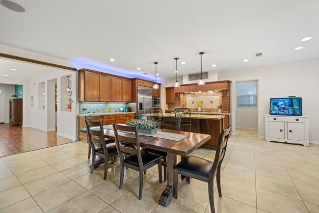 Building Photo - Luxurious 5-Bedroom Pool Home with Solar &...