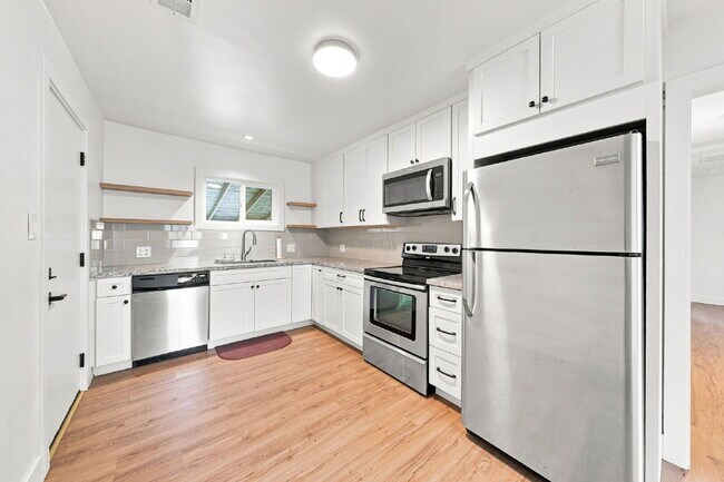 Building Photo - 3/1 Charmer in the Garden Tract - Dog Friendly