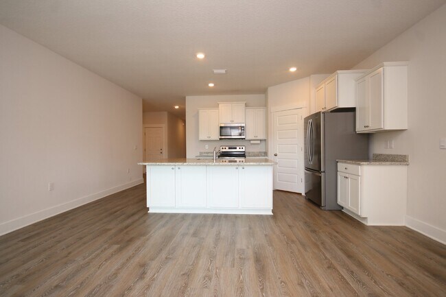 Building Photo - Stunning Modern 4-Bed, 2-Bath Home in Arbor Ridge – High Ceilings, Open Floor Plan, Granite Kitch...