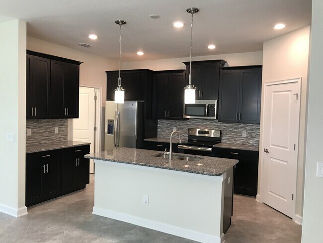 Building Photo - Just Listed! Newer 4/3 Home at The Oaks in...