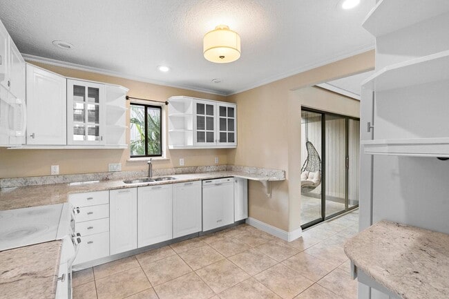 Building Photo - Lakefront lifestyle in this stunning 3-bed...