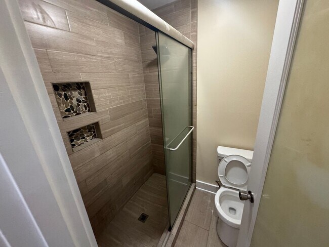 Building Photo - 3 Bedroom 3 Bath Beauty on Golf Course with Wet Bar and Storage Building