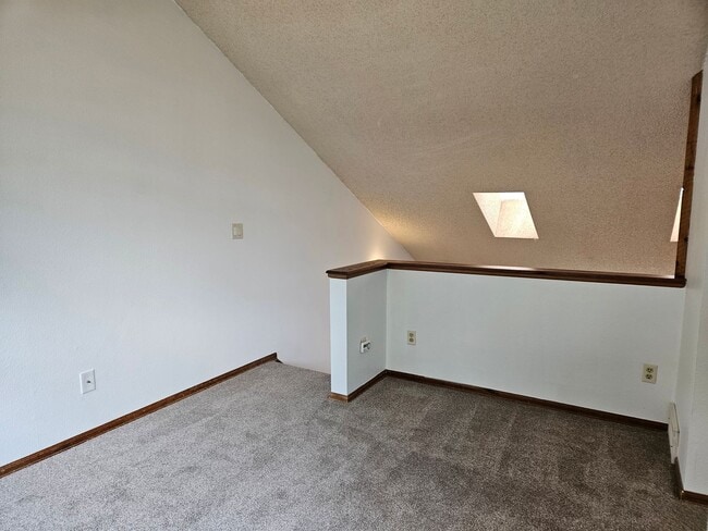 Building Photo - Adorable Loft Style One Bedroom Condo Steps from Buckley AFB