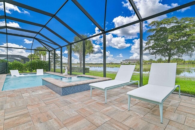 Building Photo - ** Single Family Home ~ Verdana Village ~ 3 Car Garage ~ Salt Water Pool & Lake Views **