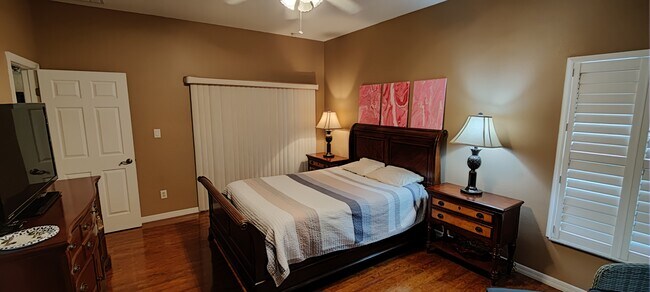 Primary bedroom sliding glass doors to patio - 3602 Westover Cir