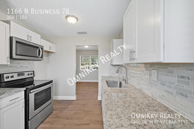 Building Photo - 1166 N Texas 78 Business