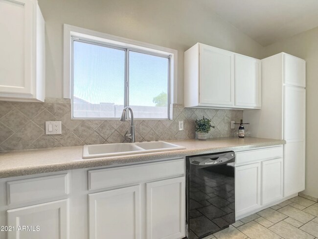 Building Photo - 16084 W Mesquite Dr