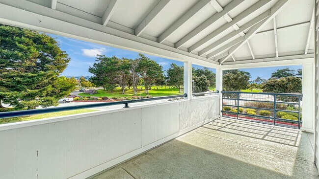 Building Photo - Exceptional Corner Unit w/ Wraparound Sout...