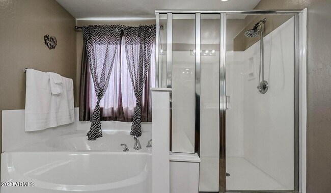 Building Photo - 12217 W Chase Ln