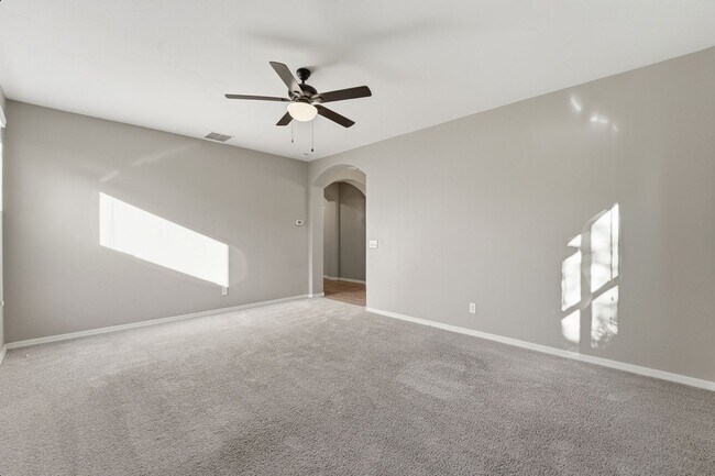 Building Photo - Stunning 4-Bed + Den Eastmark Home with Modern Upgrades Throughout