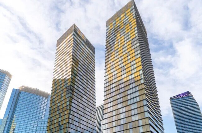 Building Photo - BEAUTIFULLY FURNISHED, MOVE-IN READY HIGH-RISE CONDO WITH STUNNING VIEWS!